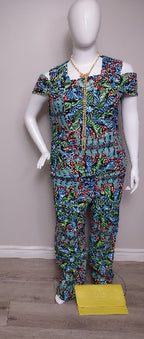 Colorful patterned outfit on a mannequin against a plain background